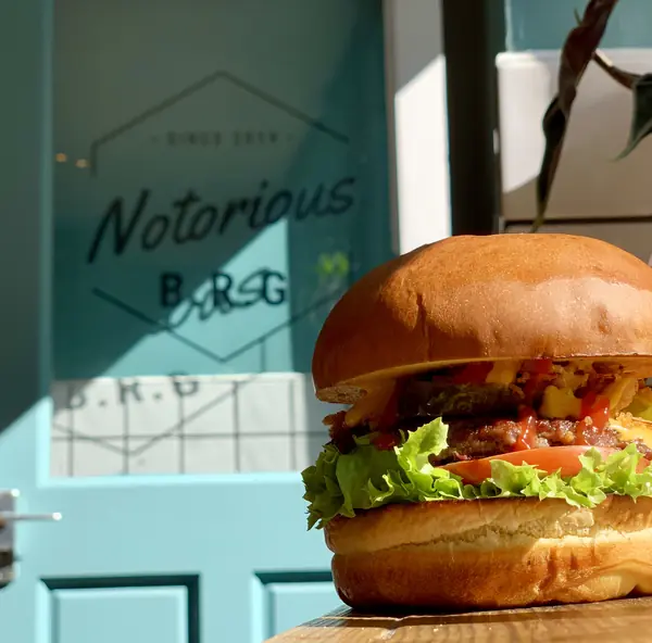 Burger in front of the Notorious B.R.G window lettering